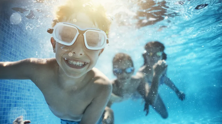 Kids swimming in a pool