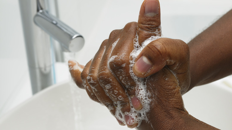 Person washing their hands
